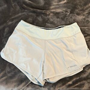 Brooks baby blue running shorts, size L